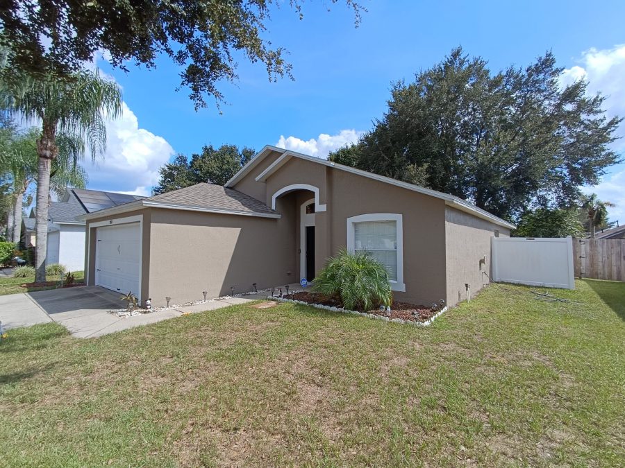 Exterior beige painting in Davenport, FL.