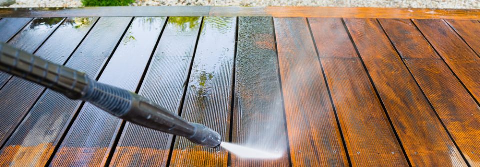 Power washing deck before staining