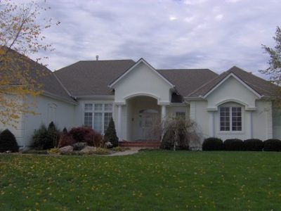 Exterior painting by CertaPro house painters in Lee's Summit, MO