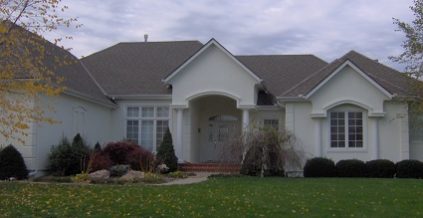 Stately Columns Accent This Exterior Painted Home ...