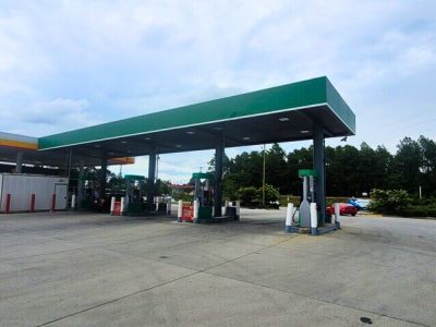 commercial exterior painting for diesel station canopy