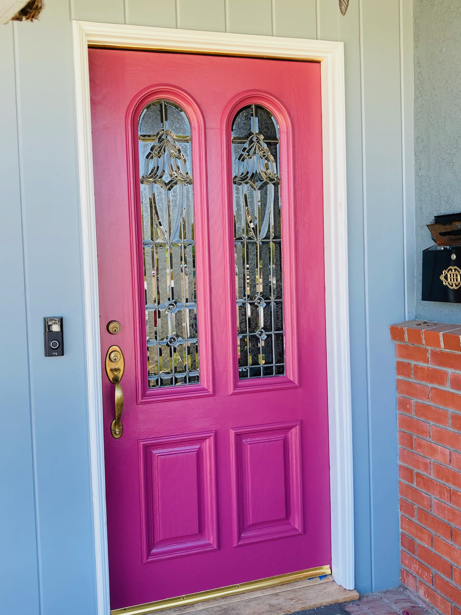 Front door of house painted light purple.