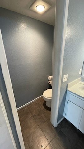Bathroom painted light gray with white trim. Preview Image 2