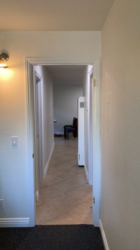 white textured walls and semi-gloss white door trim. Preview Image 3