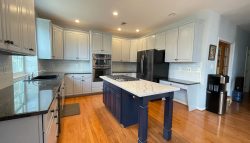 Navy Blue Island in the center of the kitchen