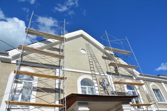 Stucco repairs on a residential home.