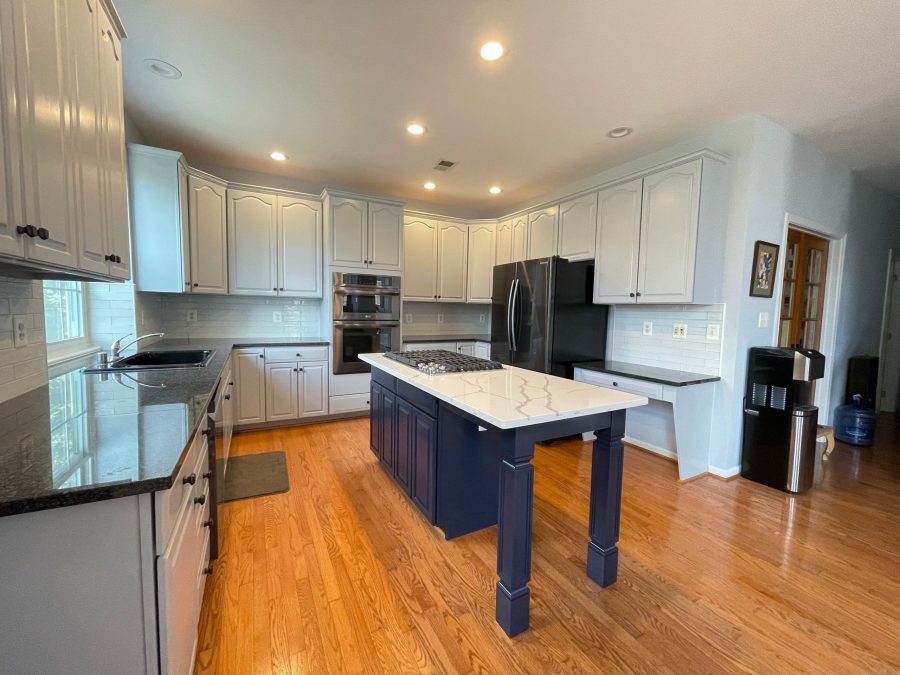 Navy Blue Island in the center of the kitchen