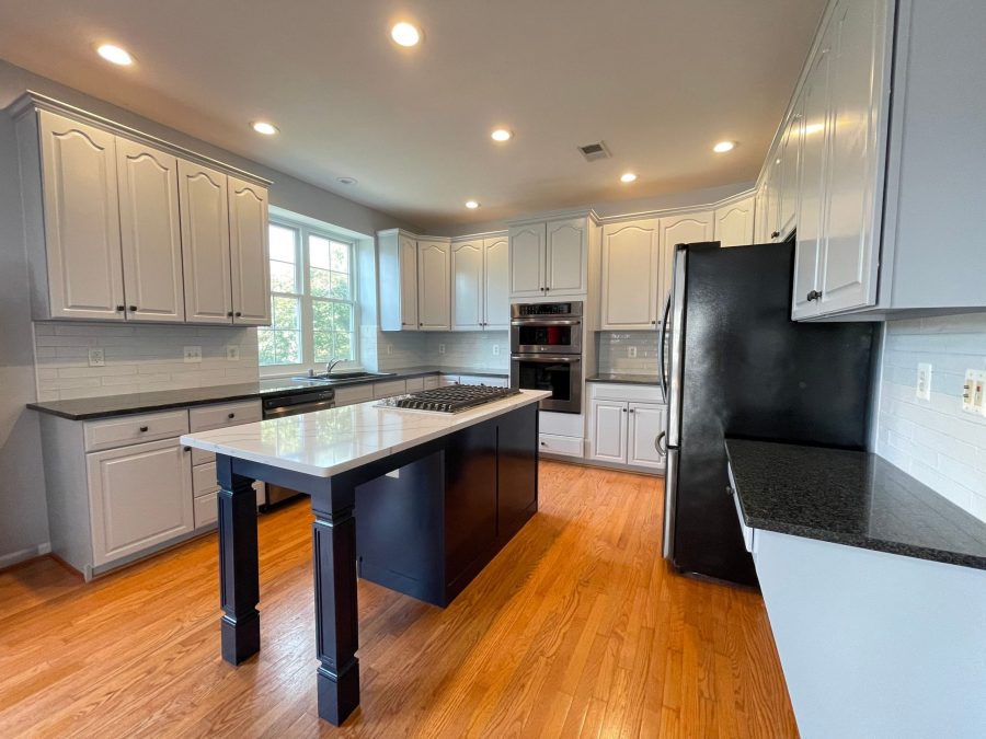 Interior Painting of Kitchen painted white and navy blue Preview Image 1