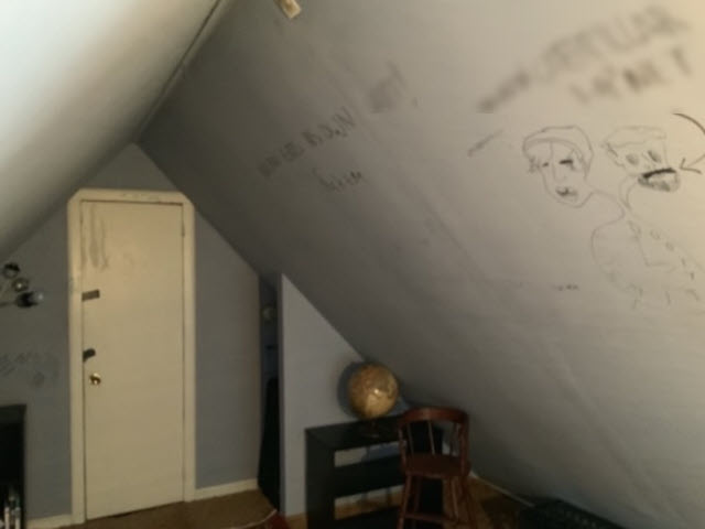 photo of bedroom walls with graffiti in the highlands