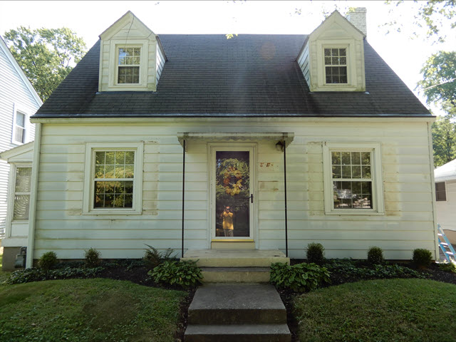 photo of exterior of home in louisville before being repainted