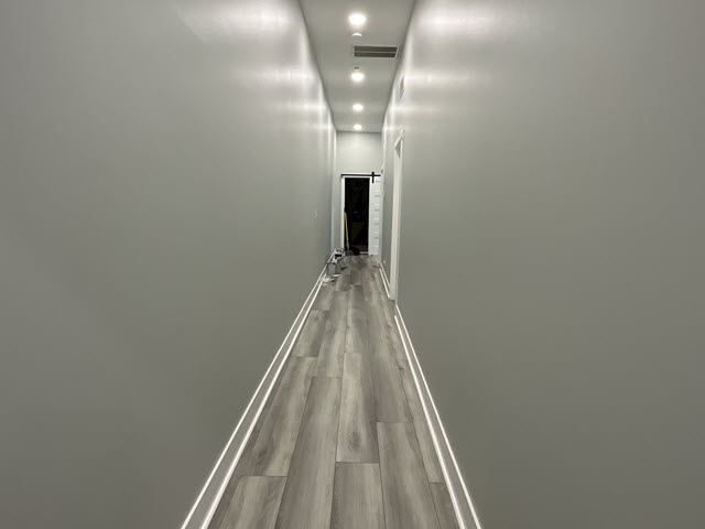 photo of hallway in old louisville before being repainted