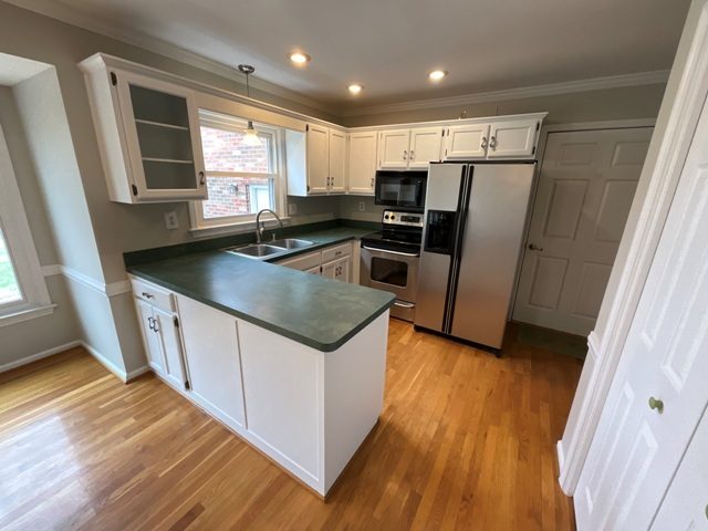 photo of repainted kitchen cabinets in st. regis park Preview Image 2