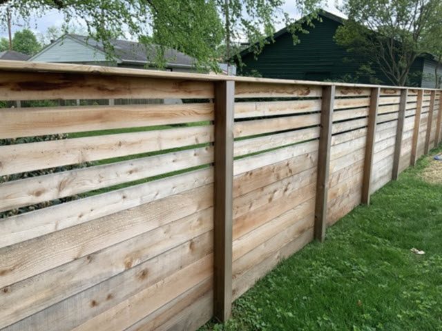 photo of fence before being stained Preview Image 1