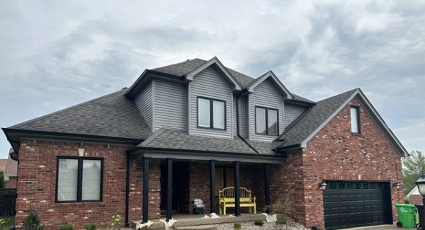 after photo of front overhang support beams and wooden accents in louisville