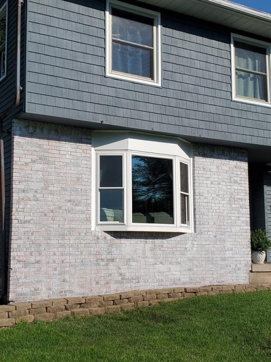 limewash exterior brick home