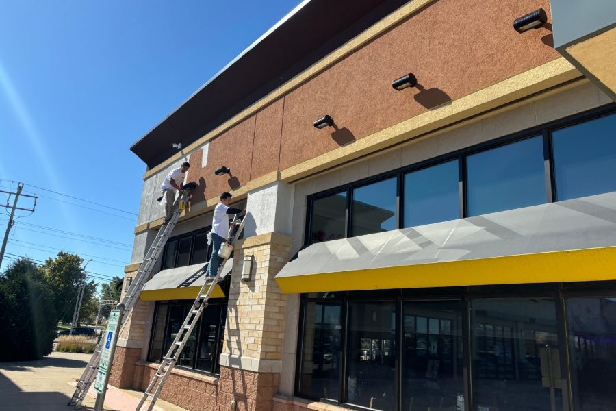 Retail Shops Case Study during photo men on ladders painting facade Preview Image 9