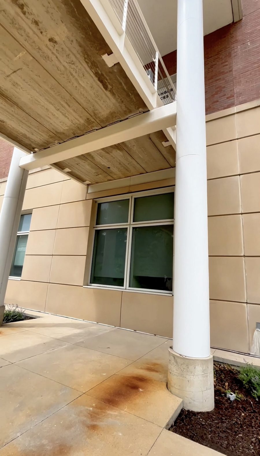 underside of bridge and columns connected to building Preview Image 5