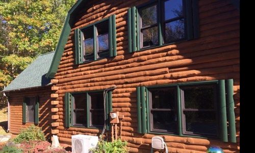 Completed log home staining in turner, me, by certapro painters of maine