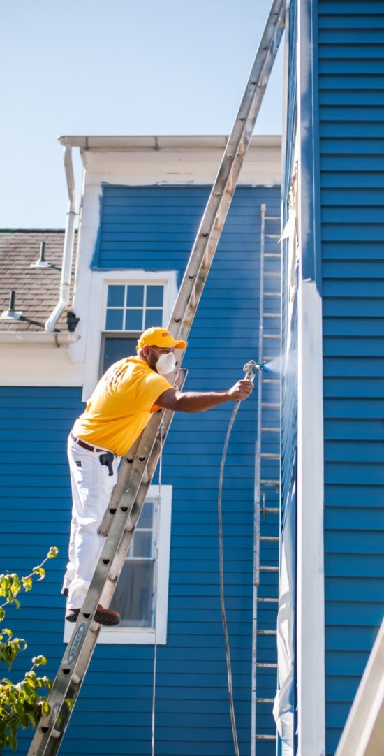 spray painting process for home exterior siding