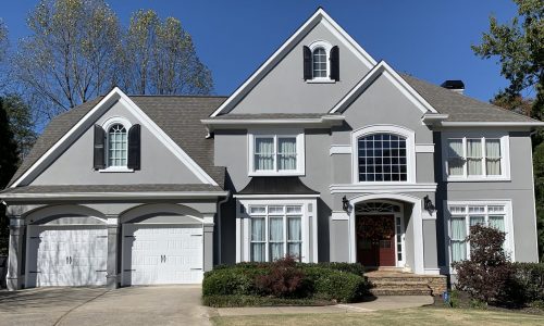 Exterior Painted Stucco Home with Double Garage