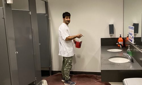Employee Painting Restroom