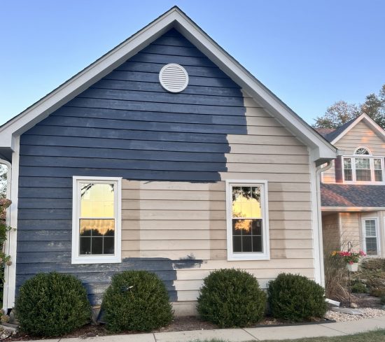 house siding during beige to navy paint transition