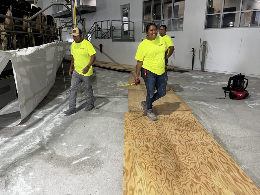 McCarty Farms Commercial Flooring Project walking on a wood plank over flooring Preview Image 16