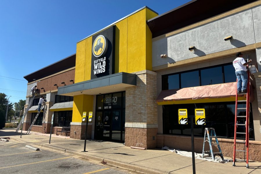 Retail Shops Case Study during photo of of men painting front of buffalo wild wings Preview Image 9
