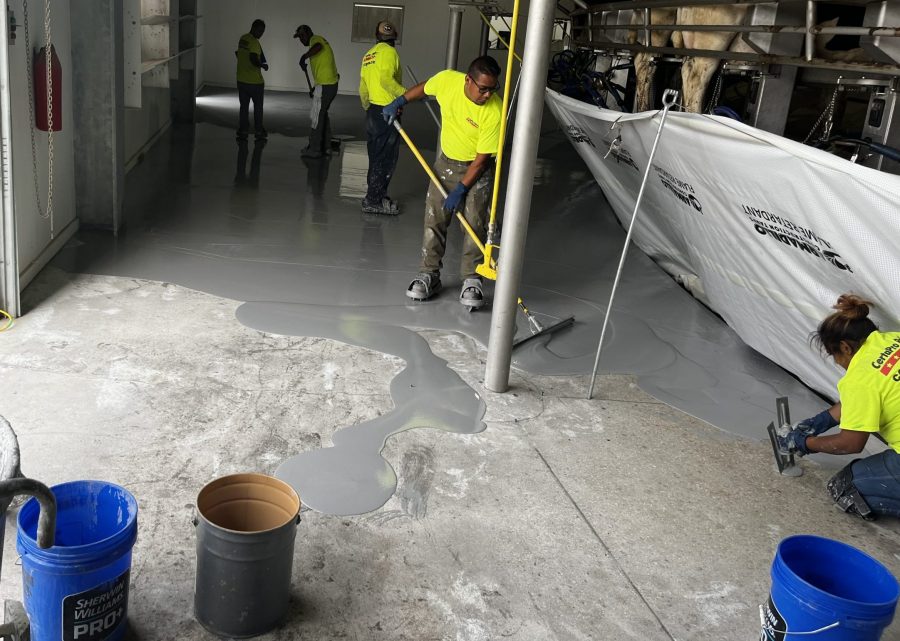 McCarty Farms Commercial Flooring Project spreading product near loading dock Preview Image 6