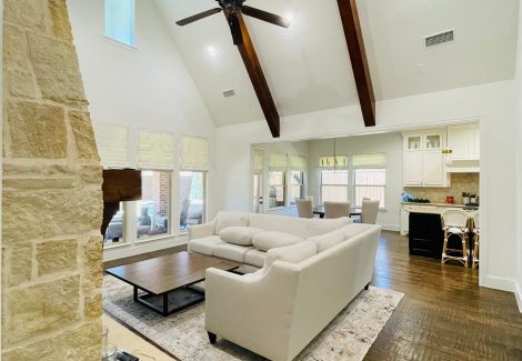 living room with vaulted ceilings