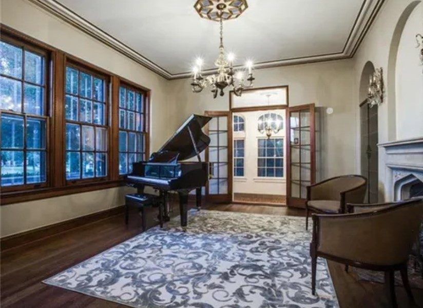 white painted room with black piano Preview Image 4