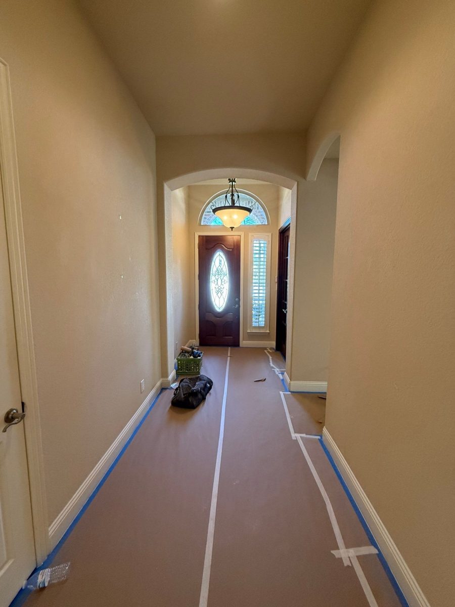 front hallway with protective sheeting for painting Preview Image 6