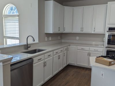 View of repainted kitchen cabinets in a home in Bowie, MD