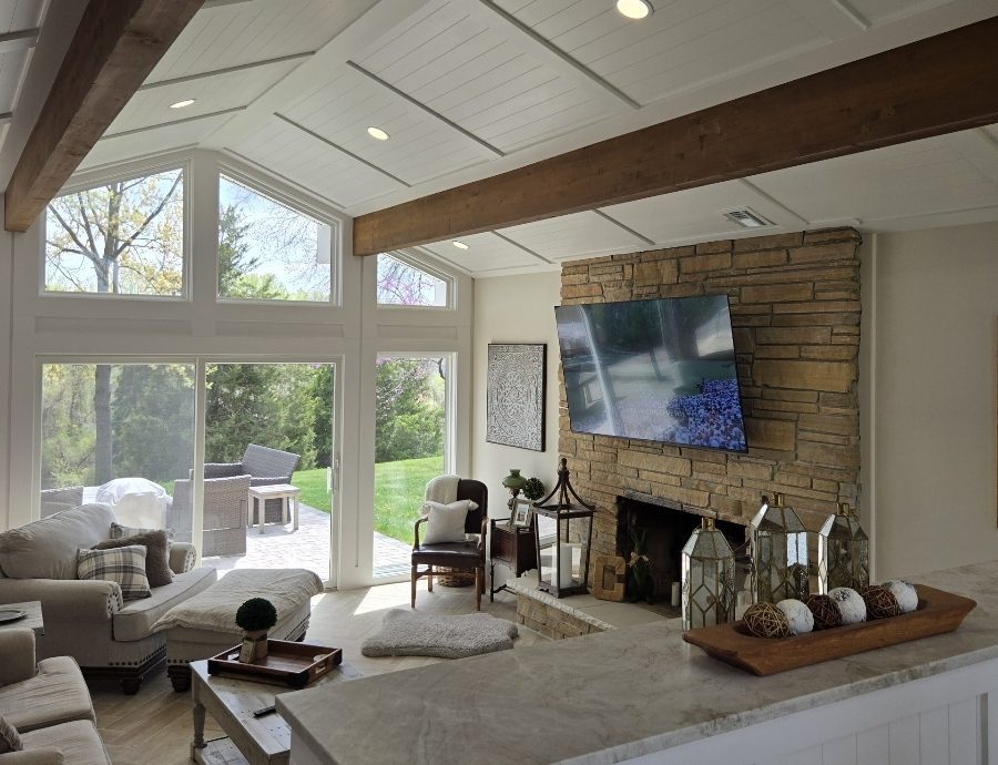 living room with brick fireplace