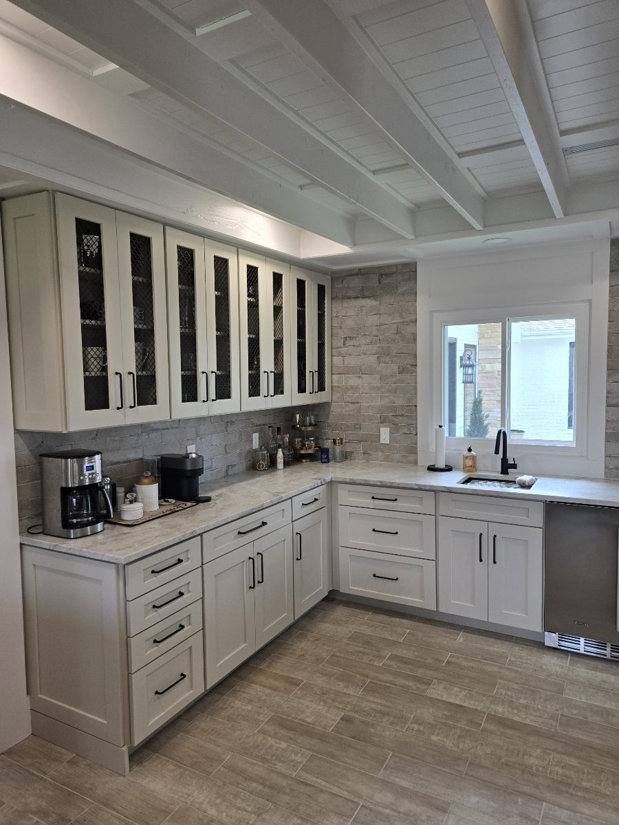 kitchen with white cabinets and granite countertops