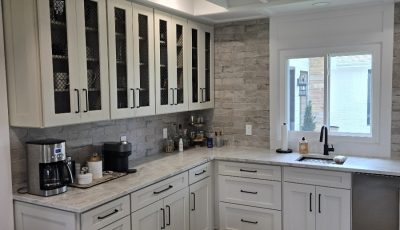 kitchen with white cabinets and granite countertops