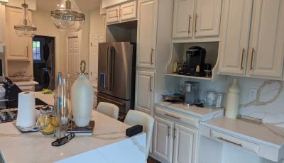 Freshly painted white kitchen cabinets at a home in Lothian, MD