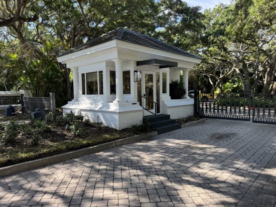 white painted community entrance guardhouse