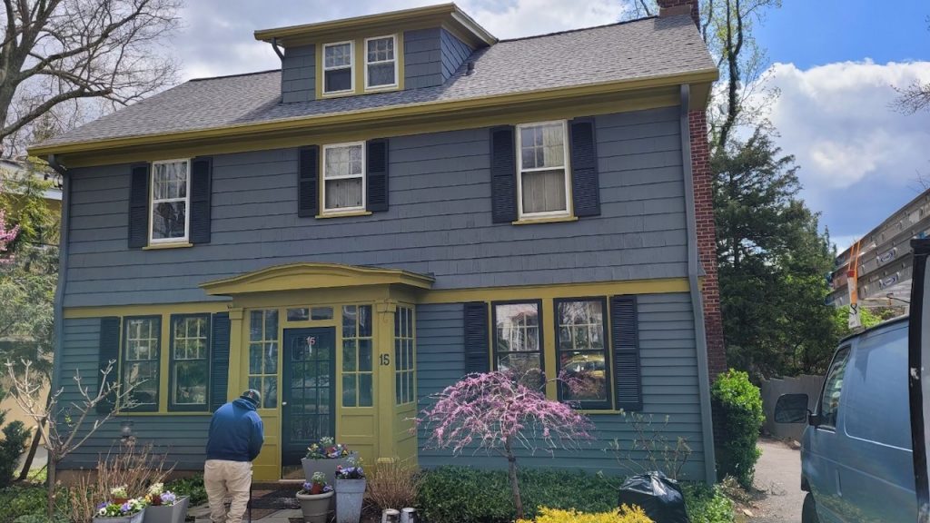 New Exterior House Paint a dark blue color