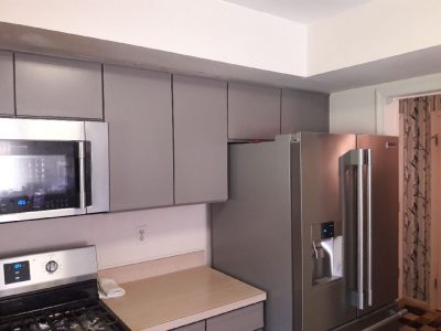 Interior kitchen cabinet painting by CertaPro house painters in Skillman, NJ