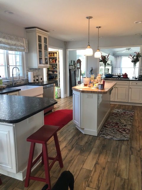 gray painted kitchen and dining room walls with white painted ceiling and trim