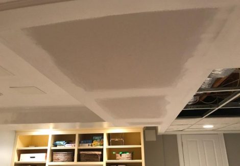 ceiling repairs are completed and preparations for painting begin