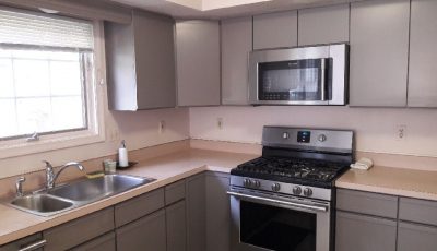 Interior kitchen cabinet painting by CertaPro Painters in Skillman, NJ