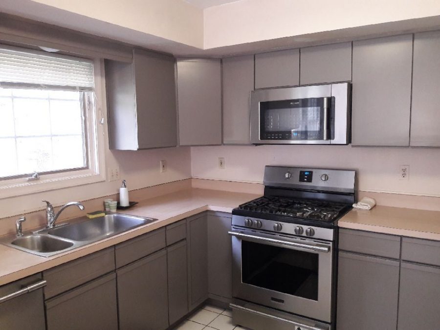 Interior kitchen cabinet painting by CertaPro Painters in Skillman, NJ