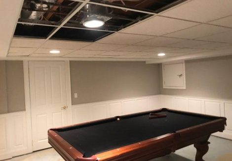 gray painted basement walls with white painted trim and ceiling