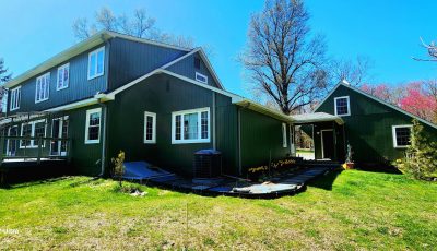 dark green painted house