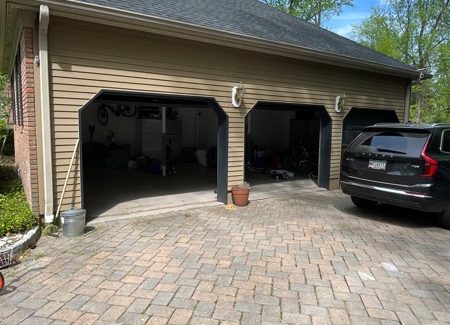 3 car garage side of house and paved driveway