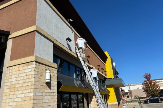 Retail Shops Case Study during photo men painting around facade