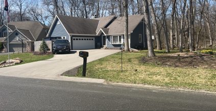 Blue Home with White Trim After Painting