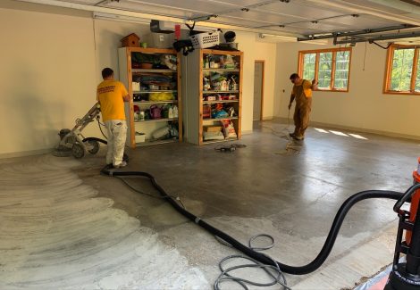 Working on garage floor sections